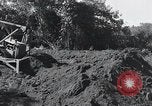 Standbild Bulldozer löscht Straße Birma, 1943, aus Sekunde 37 historischem Filmmaterial Videoclip 65675028820