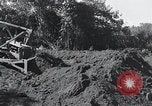 Standbild Bulldozer löscht Straße Birma, 1943, aus Sekunde 38 historischem Filmmaterial Videoclip 65675028820