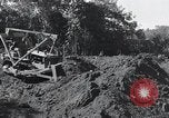 Standbild Bulldozer löscht Straße Birma, 1943, aus Sekunde 41 historischem Filmmaterial Videoclip 65675028820