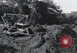 Standbild Bulldozer löscht Straße Birma, 1943, aus Sekunde 42 historischem Filmmaterial Videoclip 65675028820