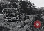 Standbild Bulldozer löscht Straße Birma, 1943, aus Sekunde 43 historischem Filmmaterial Videoclip 65675028820