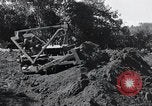 Standbild Bulldozer löscht Straße Birma, 1943, aus Sekunde 44 historischem Filmmaterial Videoclip 65675028820