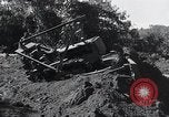 Standbild Bulldozer löscht Straße Birma, 1943, aus Sekunde 48 historischem Filmmaterial Videoclip 65675028820