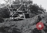 Standbild Bulldozer löscht Straße Birma, 1943, aus Sekunde 57 historischem Filmmaterial Videoclip 65675028820