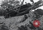 Standbild Bulldozer löscht Straße Birma, 1943, aus Sekunde 62 historischem Filmmaterial Videoclip 65675028820