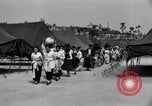 Image of Korean refugees at Tent City Kaesong Korea, 1947, second 17 stock footage video 65675028822