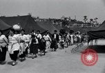 Image of Korean refugees at Tent City Kaesong Korea, 1947, second 19 stock footage video 65675028822