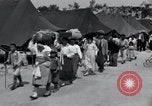 Image of Korean refugees at Tent City Kaesong Korea, 1947, second 21 stock footage video 65675028822