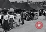 Image of Korean refugees at Tent City Kaesong Korea, 1947, second 23 stock footage video 65675028822
