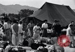 Image of Korean refugees at Tent City Kaesong Korea, 1947, second 39 stock footage video 65675028822
