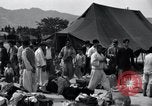 Image of Korean refugees at Tent City Kaesong Korea, 1947, second 40 stock footage video 65675028822