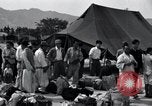 Image of Korean refugees at Tent City Kaesong Korea, 1947, second 41 stock footage video 65675028822