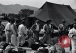 Image of Korean refugees at Tent City Kaesong Korea, 1947, second 42 stock footage video 65675028822