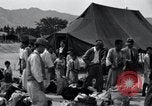 Image of Korean refugees at Tent City Kaesong Korea, 1947, second 43 stock footage video 65675028822