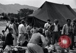 Image of Korean refugees at Tent City Kaesong Korea, 1947, second 44 stock footage video 65675028822