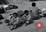 Image of Korean refugees at Tent City Kaesong Korea, 1947, second 47 stock footage video 65675028822