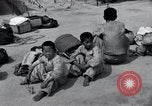 Image of Korean refugees at Tent City Kaesong Korea, 1947, second 49 stock footage video 65675028822