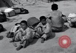 Image of Korean refugees at Tent City Kaesong Korea, 1947, second 50 stock footage video 65675028822