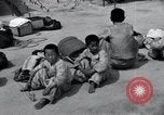 Image of Korean refugees at Tent City Kaesong Korea, 1947, second 51 stock footage video 65675028822