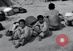 Image of Korean refugees at Tent City Kaesong Korea, 1947, second 52 stock footage video 65675028822