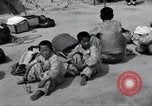 Image of Korean refugees at Tent City Kaesong Korea, 1947, second 53 stock footage video 65675028822