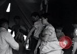 Image of Korean refugees at Tent City Kaesong Korea, 1947, second 61 stock footage video 65675028822