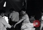 Image of Korean refugees at Tent City Kaesong Korea, 1947, second 62 stock footage video 65675028822