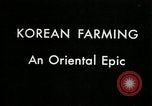 Image of Korean rice farmer Kim and family Korea, 1936, second 4 stock footage video 65675028840