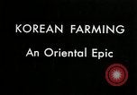 Image of Korean rice farmer Kim and family Korea, 1936, second 8 stock footage video 65675028840
