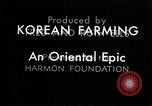 Image of Korean rice farmer Kim and family Korea, 1936, second 9 stock footage video 65675028840