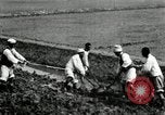 Image of Korean farmers using shovel Korea, 1936, second 18 stock footage video 65675028841