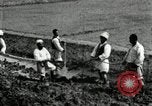 Image of Korean farmers using shovel Korea, 1936, second 34 stock footage video 65675028841