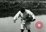 Standbild koreanischen Bauern streut Samen in Reis Bereich Korea, 1936, aus Sekunde 35 historischem Filmmaterial Videoclip 65675028844