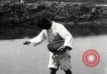 Standbild koreanischen Bauern streut Samen in Reis Bereich Korea, 1936, aus Sekunde 36 historischem Filmmaterial Videoclip 65675028844