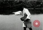 Standbild koreanischen Bauern streut Samen in Reis Bereich Korea, 1936, aus Sekunde 42 historischem Filmmaterial Videoclip 65675028844