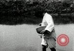 Standbild koreanischen Bauern streut Samen in Reis Bereich Korea, 1936, aus Sekunde 43 historischem Filmmaterial Videoclip 65675028844