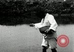 Standbild koreanischen Bauern streut Samen in Reis Bereich Korea, 1936, aus Sekunde 44 historischem Filmmaterial Videoclip 65675028844