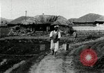 Image of Korean farmers spread manure Korea, 1936, second 62 stock footage video 65675028847