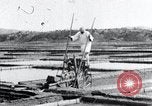 Image of Korean farmer irrigates rice field Korea, 1936, second 35 stock footage video 65675028850