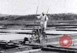 Image of Korean farmer irrigates rice field Korea, 1936, second 40 stock footage video 65675028850