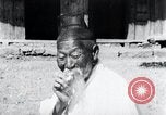 Image of Devil Post in crop field Korea, 1936, second 24 stock footage video 65675028853