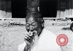 Image of Devil Post in crop field Korea, 1936, second 25 stock footage video 65675028853