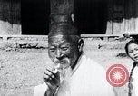 Image of Devil Post in crop field Korea, 1936, second 26 stock footage video 65675028853