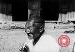 Image of Devil Post in crop field Korea, 1936, second 32 stock footage video 65675028853