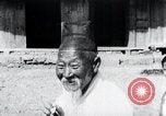 Image of Devil Post in crop field Korea, 1936, second 33 stock footage video 65675028853
