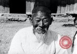 Image of Devil Post in crop field Korea, 1936, second 35 stock footage video 65675028853