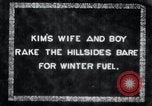 Image of Korean farmer's wife and son collect wood Korea, 1936, second 1 stock footage video 65675028854