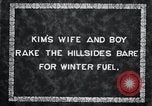 Image of Korean farmer's wife and son collect wood Korea, 1936, second 3 stock footage video 65675028854