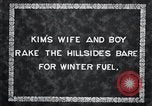 Image of Korean farmer's wife and son collect wood Korea, 1936, second 5 stock footage video 65675028854