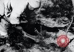 Image of Korean farmer's wife and son collect wood Korea, 1936, second 31 stock footage video 65675028854